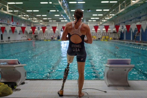 Melissa Stockwell, pauses during her swimming at a sport complex during a daily training in Colorado Springs, Colo. on Friday Aug. 6, 2021. (AP Photo/Emilio Morenatti)