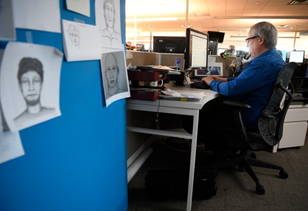 Reporter Kirk Mitchell at his desk in The Denver Post's newsroom on August 23, 2017. (Photo by Andy Cross/The Denver Post)