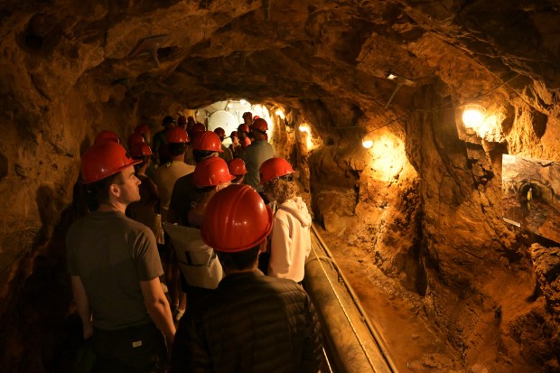 Visitors on a guided tour in the Argo Tunnel above of Argo Mill in Idaho Springs, The tunnel was built from Idaho Springs to Central City at the dawn of the 20th century. (Hyoung Chang/The Denver Post)