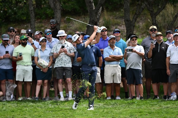 Keegan Bradley kicks up some grass as he swings in the rough on the third hole during the final round of the BMW Championship at Castle Pines Golf Club in Castle Rock on Aug. 25, 2024. Bradley won the tournament with a 12 under par. (Photo by Helen H. Richardson/The Denver Post)