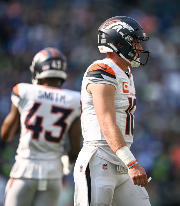 Bo Nix (10) of the Denver Broncos walks off the field after a failed conversion against the Seattle Seahawks during the third quarter of the Seahawks' 26-20 win at Lumen Field in Seattle, Washington on Sunday, Sept. 8, 2024. (Photo by AAron Ontiveroz/The Denver Post)