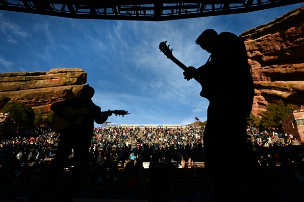 Lance Swearengin, left, and Josh Harwood, right, both members of the Blood Brothers 303, perform as people start to leave at the end the 76th annual Easter sunrise service at Red Rocks Amphitheatre on April 9, 2023 in Morrison, Colorado.