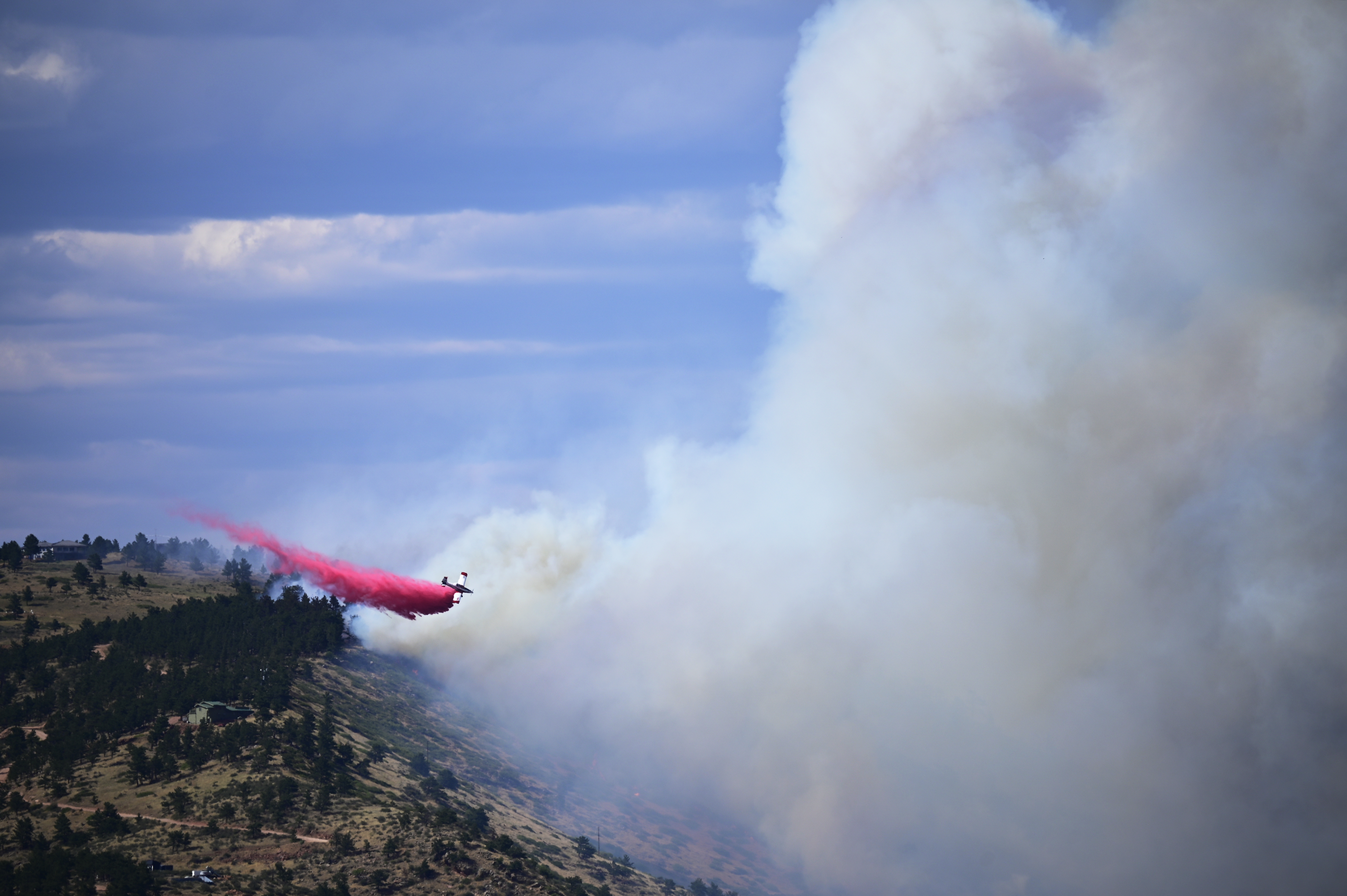 A single engine air tanker drops retardant on the Stone Canyon fire near Lyons on Tuesday, July 30, 2024. (Photo by Hyoung Chang/The Denver Post)