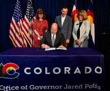 Colorado Gov. Jared Polis signed a property tax bill into law Wednesday as a conservative group withdrew two contentious initiatives from the November ballot -- culminating a deal struck by state officials with the outside advocates.