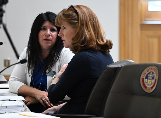 Colorado House Minority Leader Rose Pugliese, a Colorado Springs Republican, left, and Speaker Julie McCluskie, a Dillon Democrat, get ready to address the House Appropriations Committee about a property tax relief bill during a special legislative session at the Colorado State Capitol in Denver on Aug. 26, 2024. (Photo by RJ Sangosti/The Denver Post)