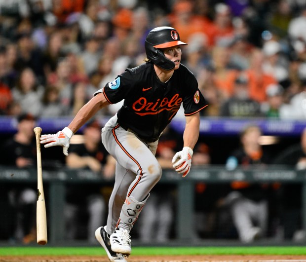 Baltimore Orioles second baseman Jackson Holliday (7) watches the flight of the ball on an RBI triple off of Colorado Rockies pitcher Angel Chivilli (57) in the 9th inning at Coors Field in Denver on Friday, Aug. 30, 2024. (Photo by Andy Cross/The Denver Post)