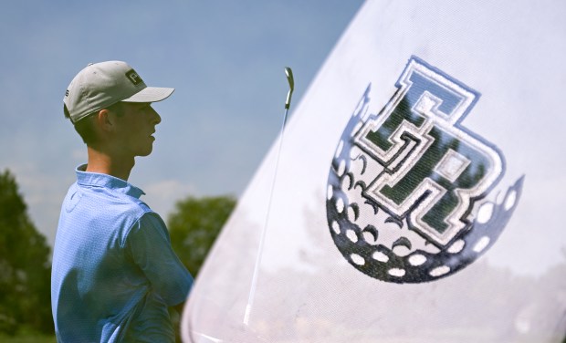 Austin Barry, a golfer for Fossil Ridge High School, looks on after hitting a ball while practicing on the driving range at Ptarmigan Country Club in Fort Collins, Colorado, on Saturday, Sept. 7, 2024. Barry, a senior at Fossil Ridge, shot a 59 in a league tournament recently. This image is an in-camera composite made from two exposures. (Photo by Alex McIntyre/Special to The Denver Post)