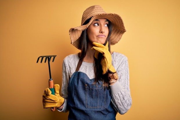 It's OK to get your hands dirty while wearing crappy clothing. (Getty Images)