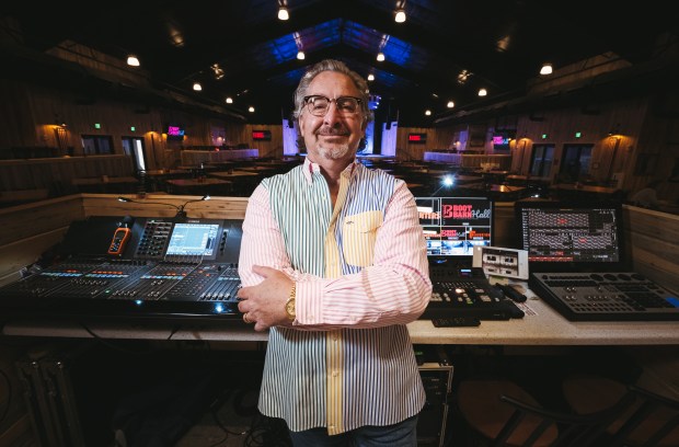 JW Roth, founder of Notes Live, stands against the soundboard in his Colorado Springs music venue, Boot Barn Hall, in this promotional image. He's next building a $40 million, 8,000 capacity amphitheater called Sunset. (Shore Fire)